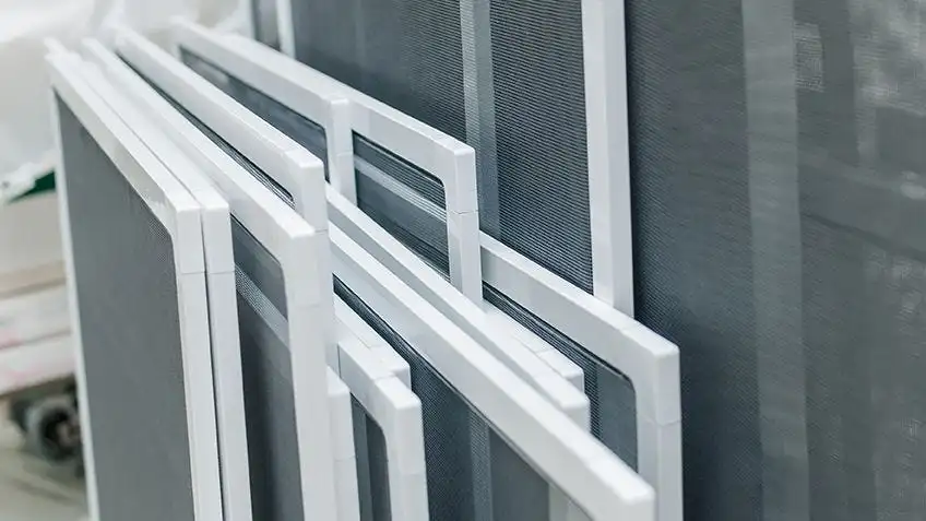 Stacked fly screens with white frames